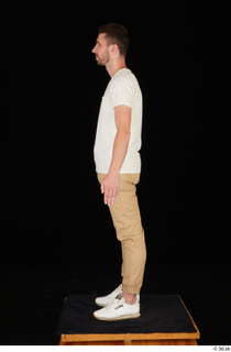  Trent brown trousers casual dressed standing white sneakers white t shirt whole body 0003.jpg